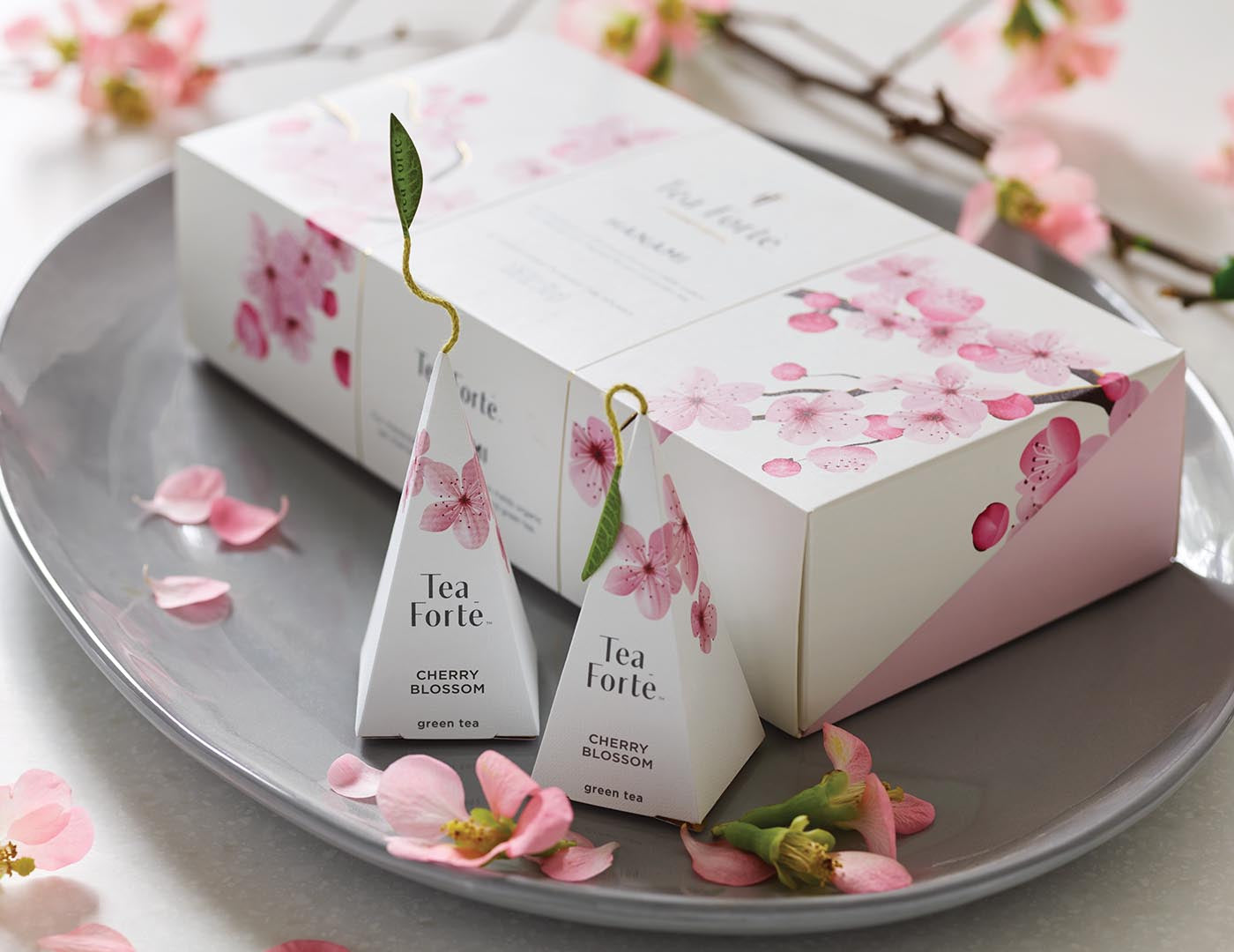 Hanami Petite Presentation Box on a tray with blossoms and infusers