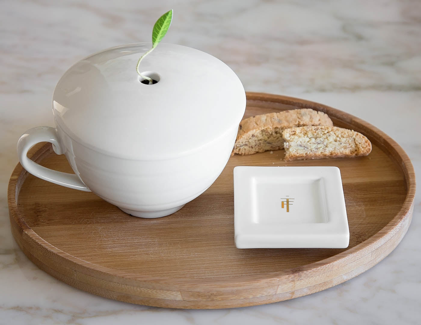 Bamboo oval tea tray showing tea cup on tray