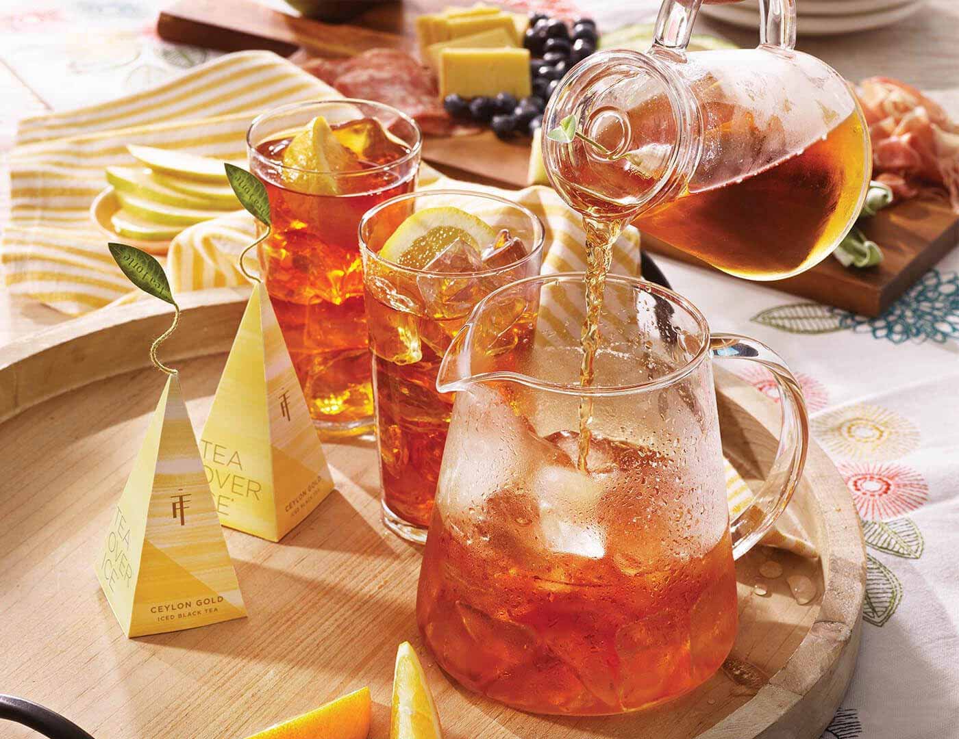 Pouring Iced Ceylon Gold into a tea over ice pitcher set