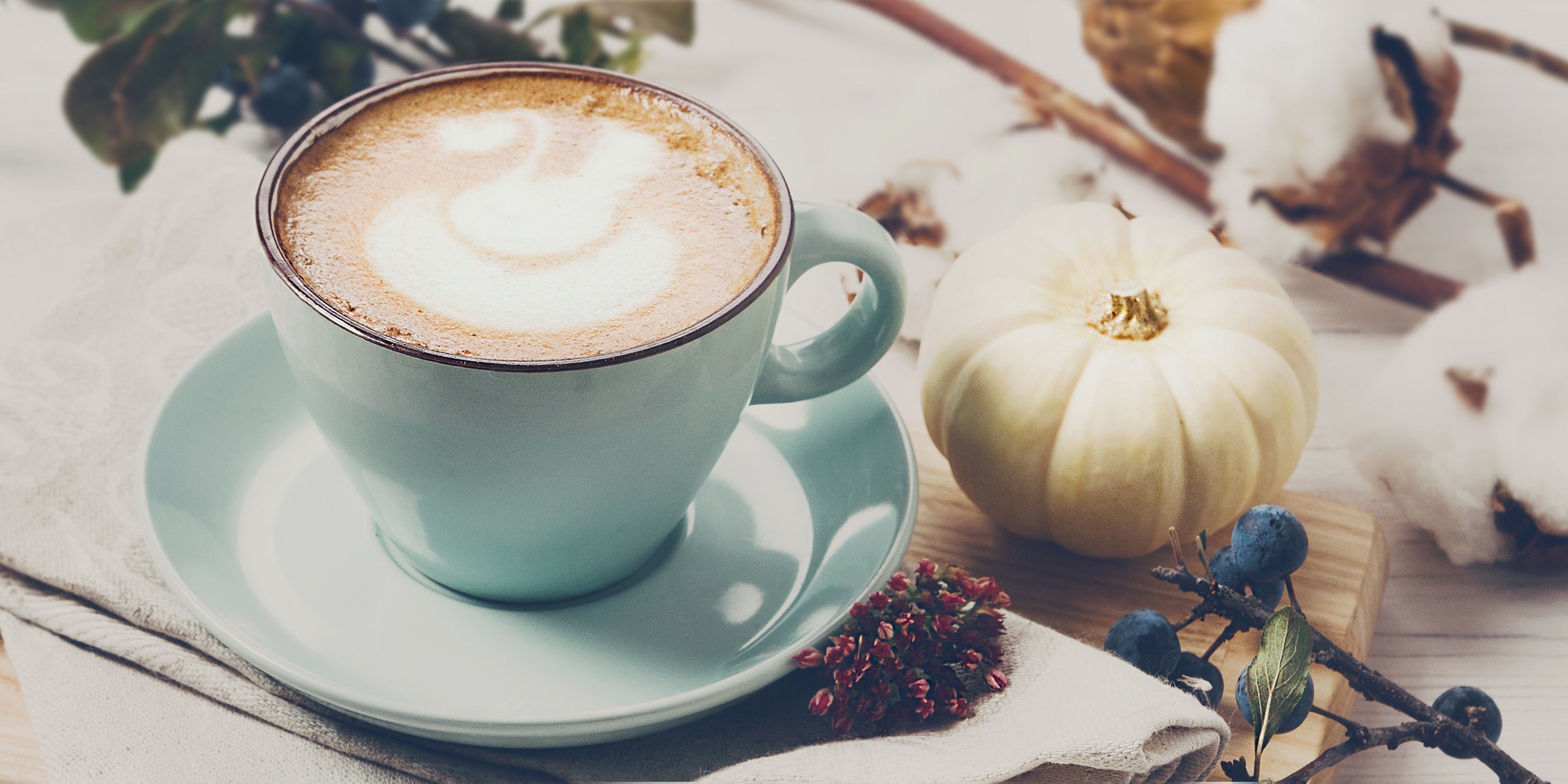 Pumpkin Spice Hot Latte in a light blue teacup